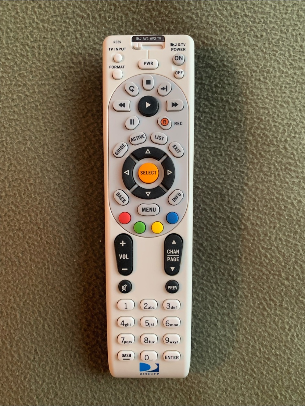 DirectTV wireless remote control. Model RC65. Black and white.